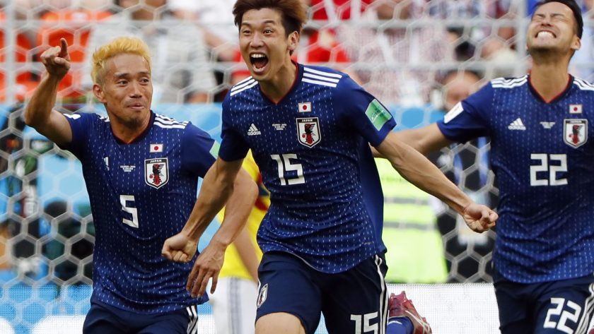 C) celebrates with teammates after scoring a goal during the Russia 2018 World Cup Group H football match between Colombia and Japan at the Mordovia Arena in Saransk on June 19, 2018.